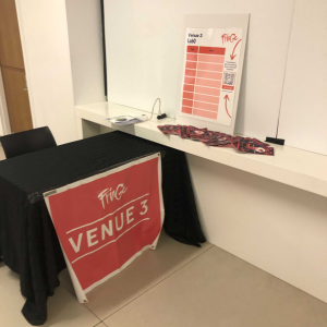 table with venue sign LabO